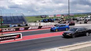 Taurus SHO vs STi - Roll Racing at Bandimere