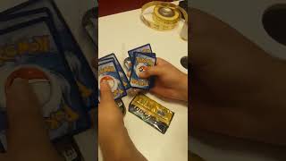 Opening a pokemon TCG Tin Inside the Nintendo store!