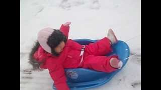 Abbie sledding