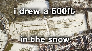 I drew a 600 foot rocket in the snow