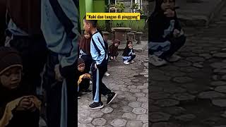 Belajar aktivitas gerak berirama kelas 1 sd-gerakan kaki dengan tanga di pinggang hitungan 1-4