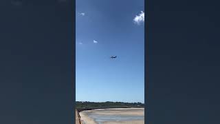 Blue Islands flight arriving from Dublin into Jersey Channel Islands over St Ouen’s Bay