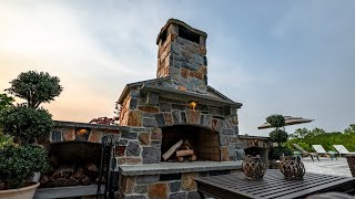 Large Outdoor Stone Fireplace in a Private Backyard