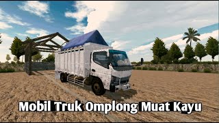 Mobil Truk Omplong Muat Kayu