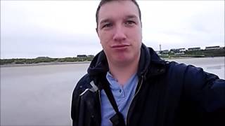 metal detecting on the beach on wet sand lots of sand on the beach