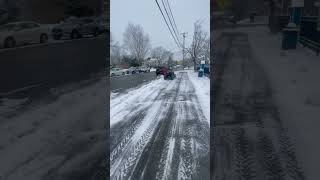 Honda rancher plows side walk in Connecticut snow