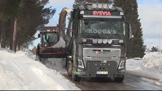 Volvo L90G with Øveraasen snowblower loading four trucks