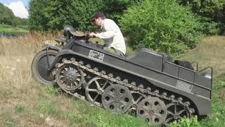 A Kettenkrad NSU HK101 crosses a ditch at the Kettenkradtreffen 2019 in Stammheim Bayern