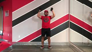 Dumbbell Shoulder Press with One and a Half Rep at the Bottom