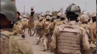 Raw video: Iraqi government forces display captured ISIS flags in Anbar