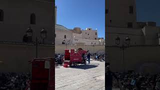 Walking at Rcif square in the medina of Fes