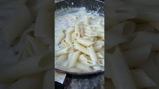 Making white sauce pasta in jungle