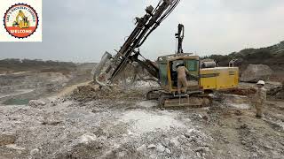 Atlas copco Powerroc T45 Hydraulic Drill is working in the mining area