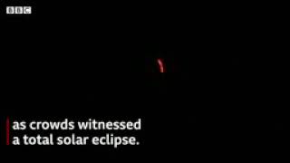 Stargazers witness solar eclipse spectacle - BBC News