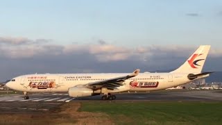 ‪China Eastern Airlines Snickers Livery A330-300 B-6083 take off from Taipei Songshan Airport