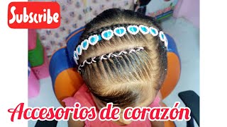 TRENZA CON ACCESORIOS DE CORAZON E HILO TORNASOL