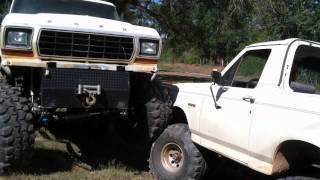 79 Bronco driving up 90 Broncos tire.