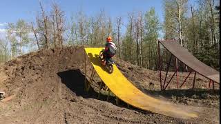 2012 Kawasaki KLX110 biggest jump over FMX ramp!!