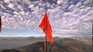 Red Flag Over Himalayan Foothills (Stock Footage)