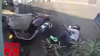 CCTV Footage showing How wearing a Helmet can save a Life