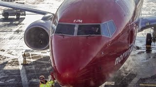 Norwegian Boeing 737 EI-FJM arrival at London Gatwick Gate 5