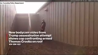 New footage! moment Thomas Crooks pointed his gun at a police officer who confronted him on the roof