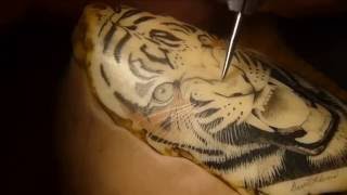 Scrimshaw Demonstration by Adams Russian Text - Tiger