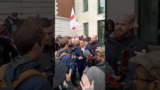 Tommy Robinson outside court today