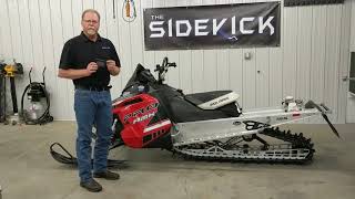 The SideKick snowmobile stand used on a Polaris Pro RMK