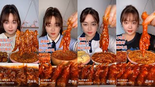 Cute chinese girl enjoys eating chicken feet mukbang