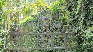 An Interesting Iron Gate with a Faun and Dragon Heads in Charleston