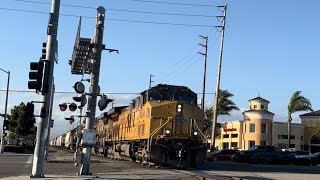 UP 6514 leads LOF66 past Gonzales Train crossing