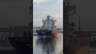 Before and after loading a giant container ship