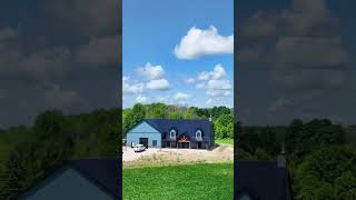 I stop by to take a look at this custom barndominium #barn #drone #timber #building #automobile