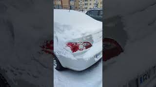 It was so cold that the first layer of snow on my Chrysler Sebring froze.