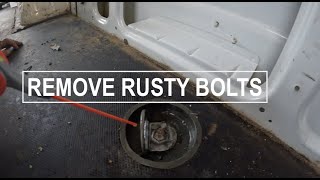 how to remove old nasty rusty bolts that hold you back from  removing the floor of your van