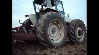 Roadless 115 Tractor cultivating field...