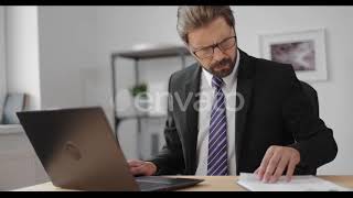 Office Worker Typing on Wireless Laptop | Stock Footage - Envato elements