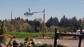 Helicopter landing at Archer Vineyard and tasting room.  Dundee Oregon