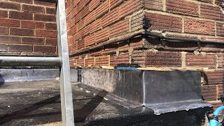 Replacing damaged flat roof with rubber paint and lead flashing