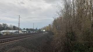 Amtrak Cascades passing through southern crossing while approaching Kelso station