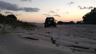 Don't watch, Jeep Liberty Playing in some Sugar sand.