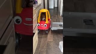 Daddy putting the dishes away = Little Tikes Cozy Coupe Morning Obstacle Course