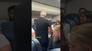 Man throws passengers luggage and gets into a fight because of a fart #airplane #fighter #short #lol