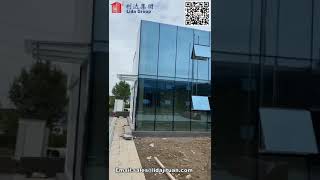 Container hotel buildings with glass curtain wall