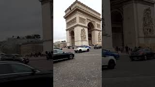 In front of the Arc de Triomphe de l'Etoile at Place Charles de Gaulle in Paris