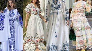 Soft white cotton hand embroidered long maxi , frocks dresses latest pattern designs collection