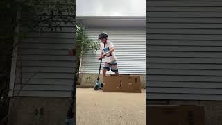 A simple bunny hop onto a box #funny #scooter #skatepark #tailwhip #shorts