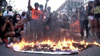 Scuffle as Flags are burnt by Protesters on Independence Day 2020