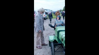 Man teaches woman to start 1914 Morgan Three-Wheeler